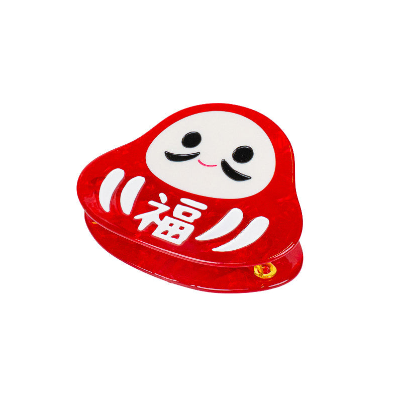 Japansk Daruma-hårklämma