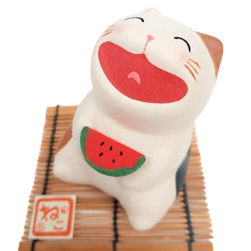 Japansk figurin med skrattande katt