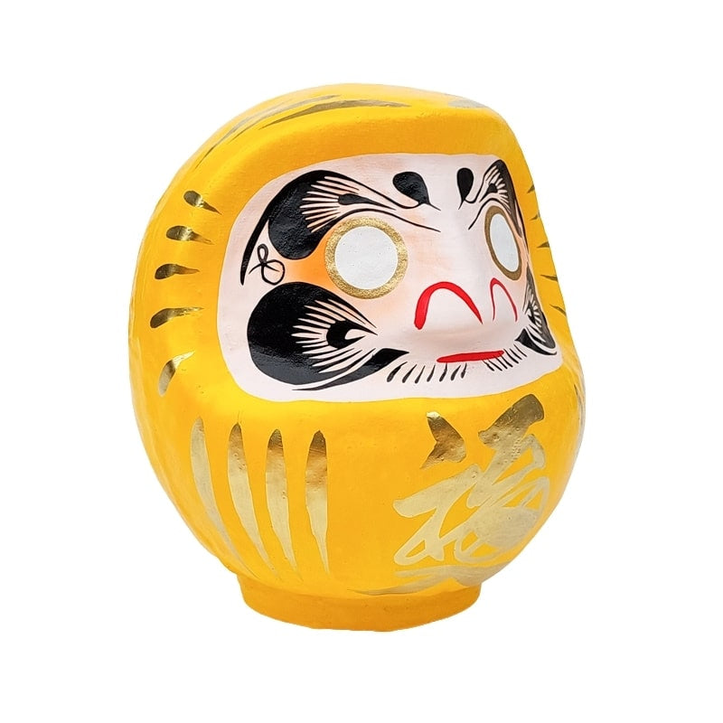 Japansk gul daruma 9 till 15 cm