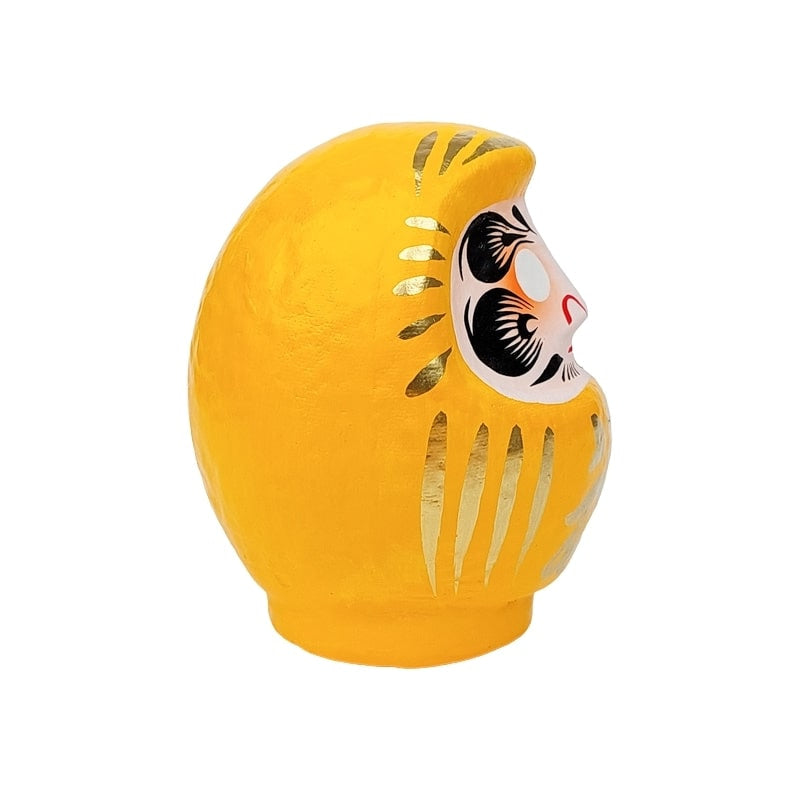 Japansk gul daruma 9 till 15 cm