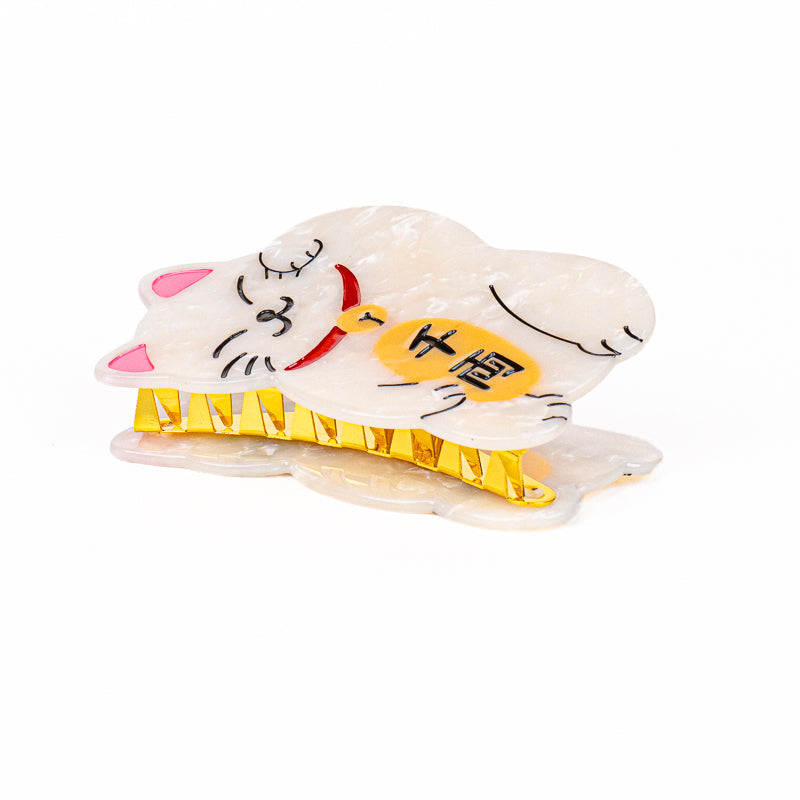 Japansk hårklämma med Maneki-Neko-motiv