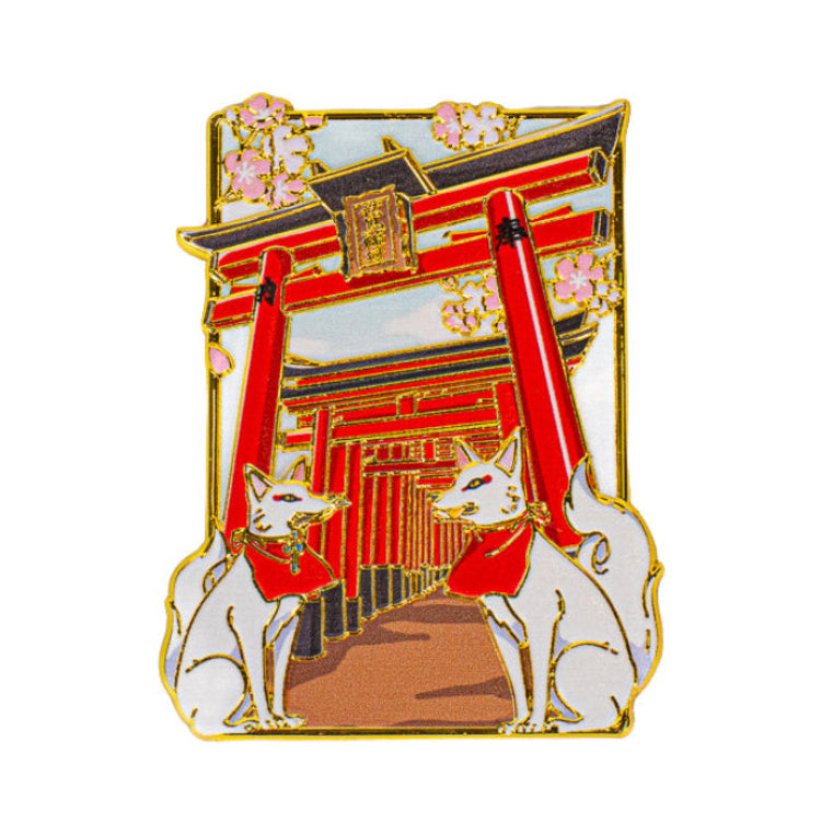 Japansk metallmagnet med motiv av torii och kitsune