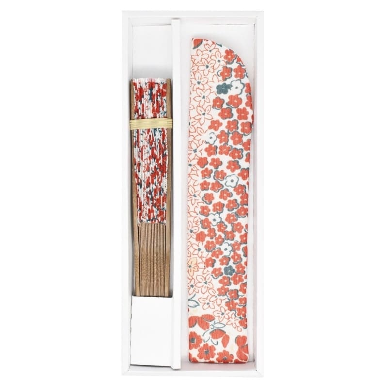 Japansk solfjäder och påse med röd blomma