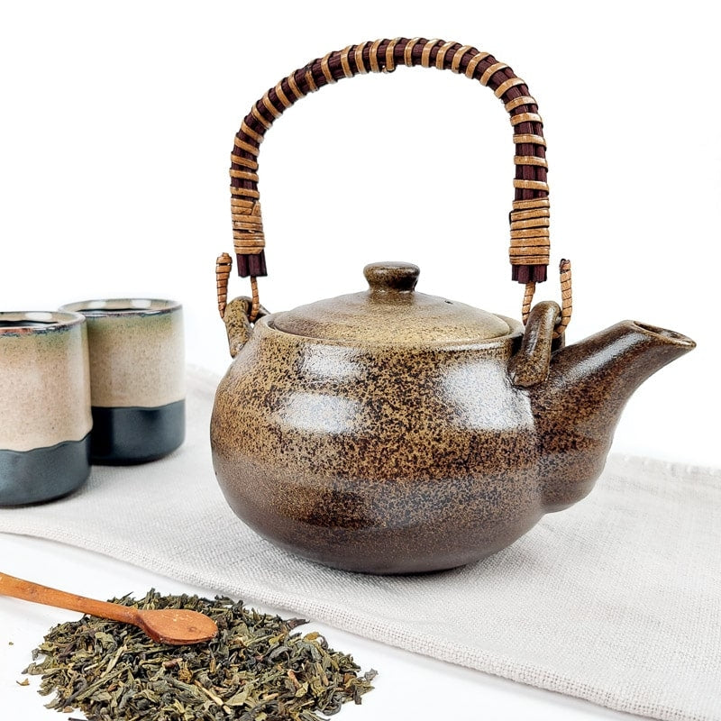 Japansk tekanna med infusionsbehållare