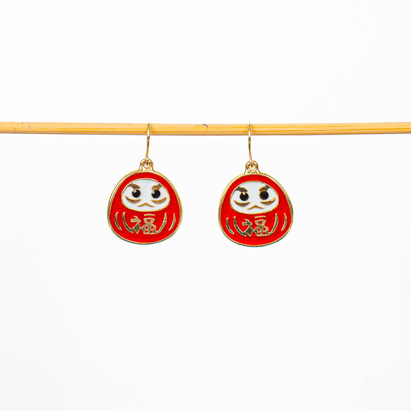 Japanska Daruma-örhängen i rött och guld
