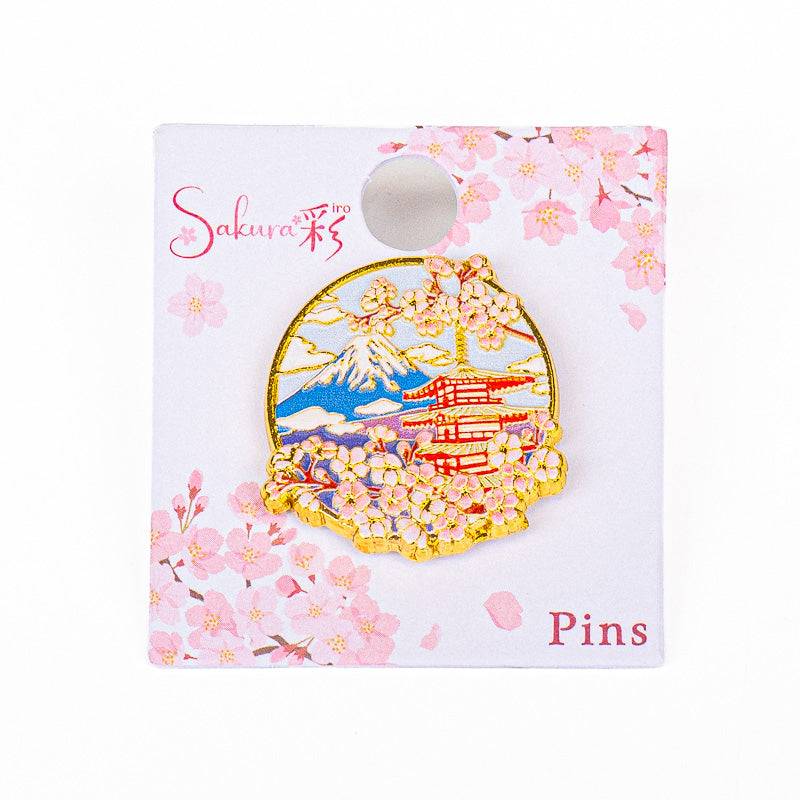 Japanska metallpins med motiv av tempel Fuji och sakura