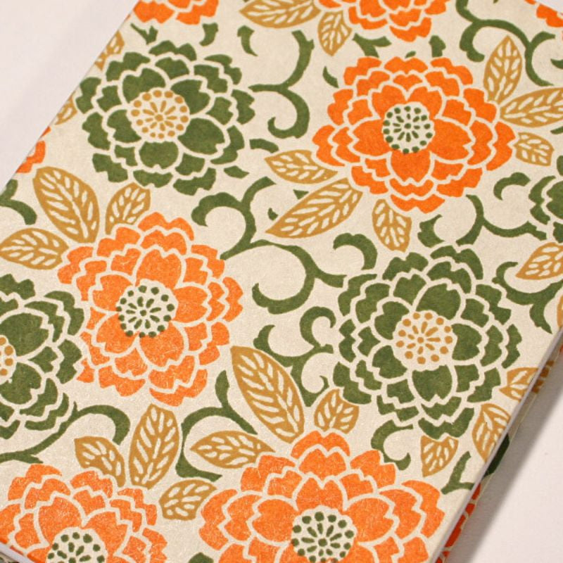 Orange japansk frimärksbok