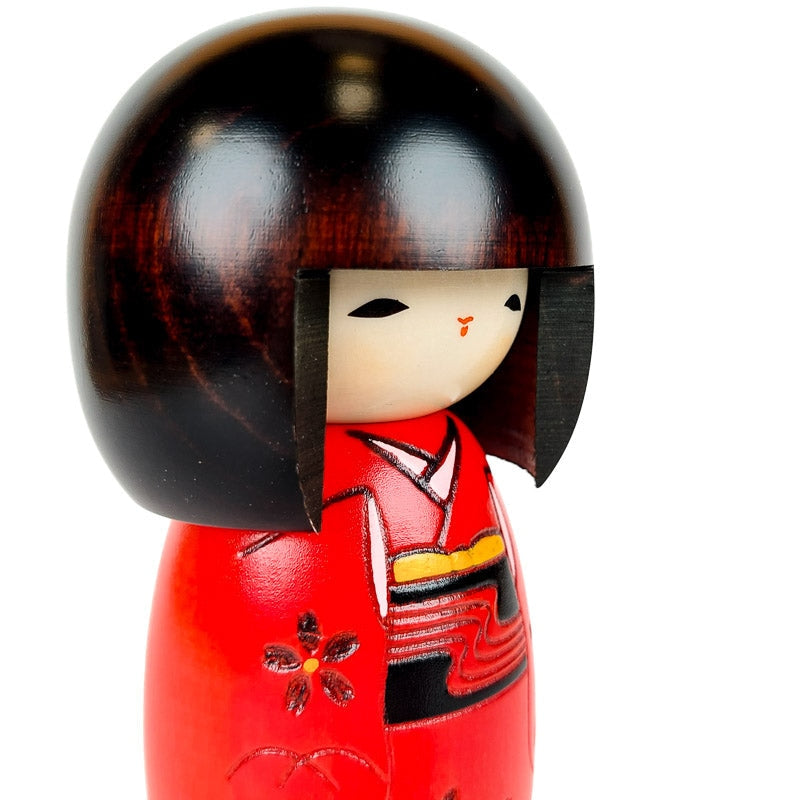 Röd Kokeshi docka