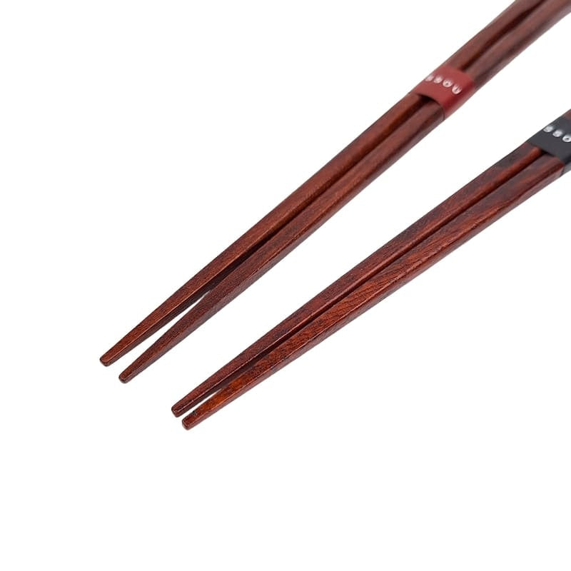 Set med japanska ätpinnar och bladhållare