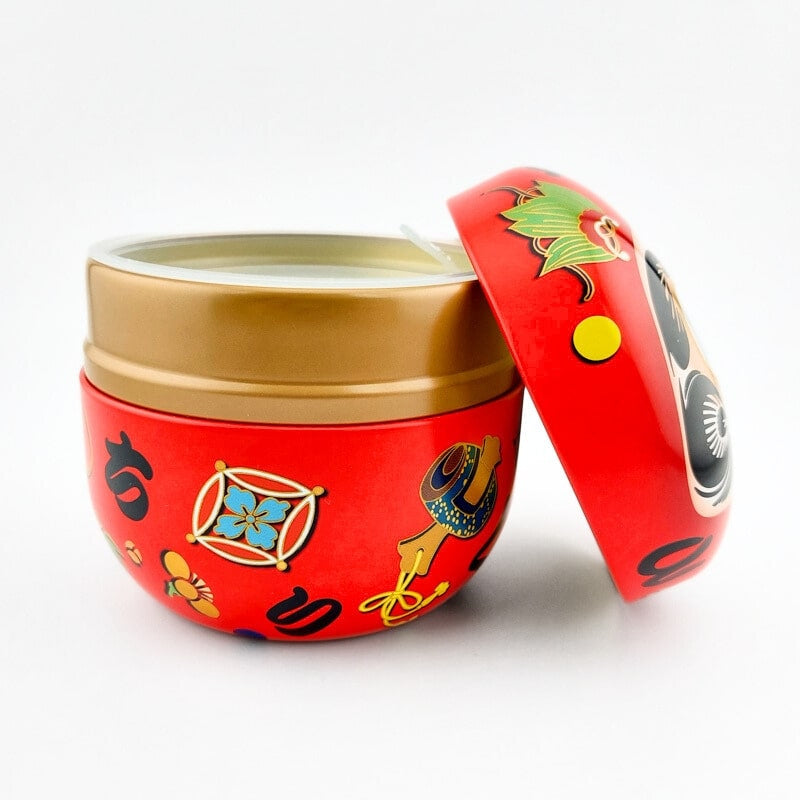Daruma röd teask i metall