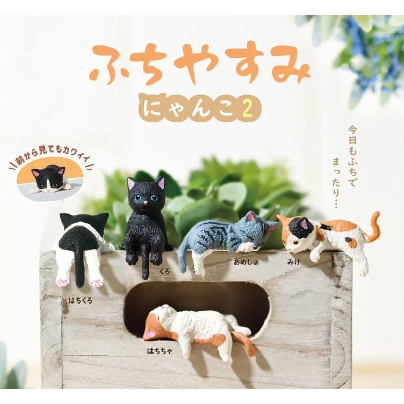 Gachapon Figurin av sovande katt