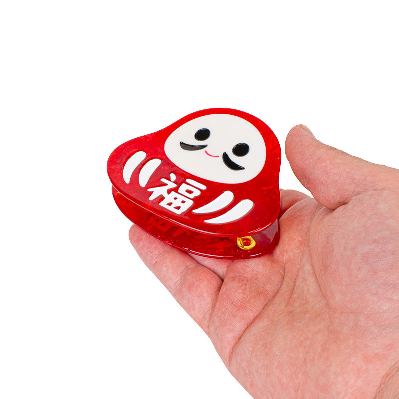 Japansk Daruma-hårklämma