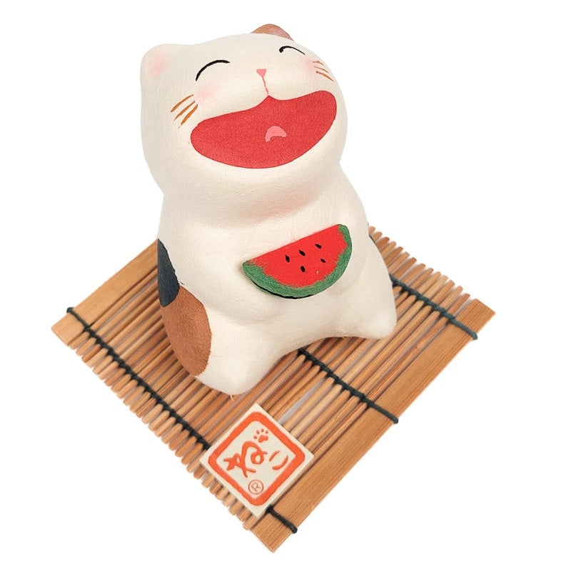 Japansk figurin med skrattande katt