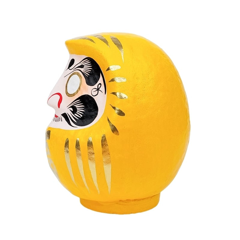 Japansk gul daruma 9 till 15 cm