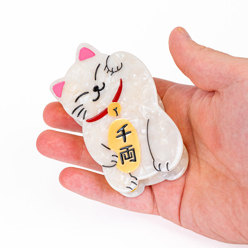 Japansk hårklämma med Maneki-Neko-motiv