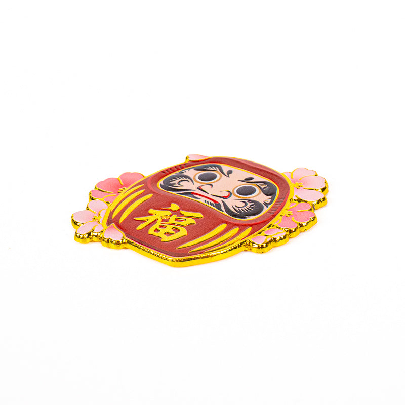 Japansk magnet i metall med Daruma och sakura