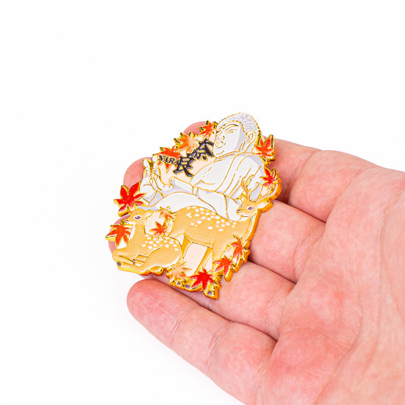 Japansk magnet i metall med hjortar och Buddha