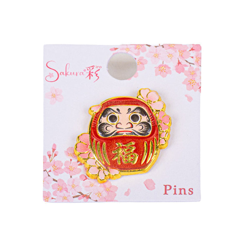 Japanska metallpins med Daruma och Sakura