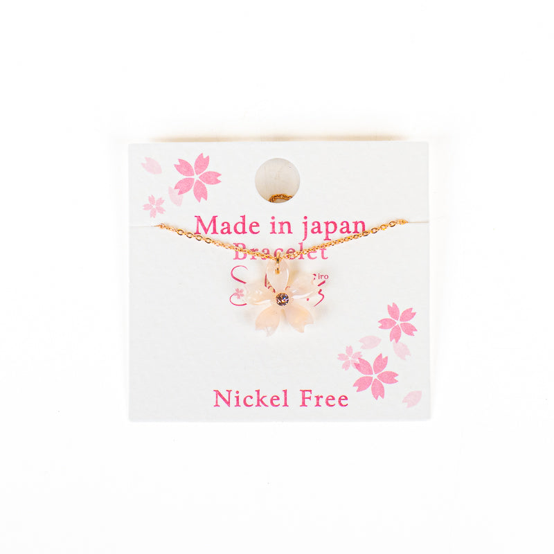 Japanskt armband med vit sakurablomma