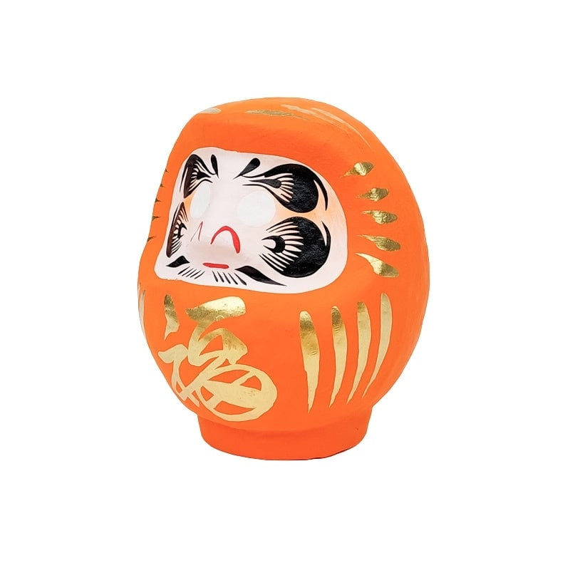 Orange japansk Daruma 9 till 15 cm