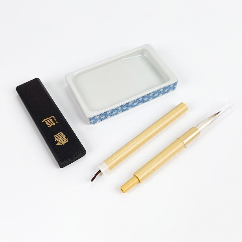 Presentförpackning med japansk kalligrafi