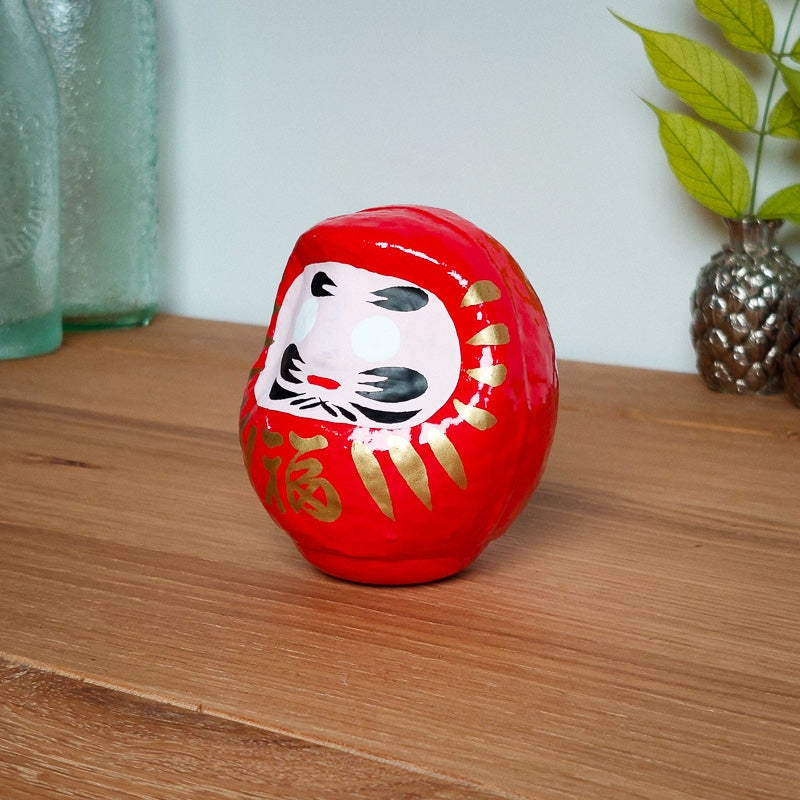 Röd japansk daruma 4,5 och 9 cm