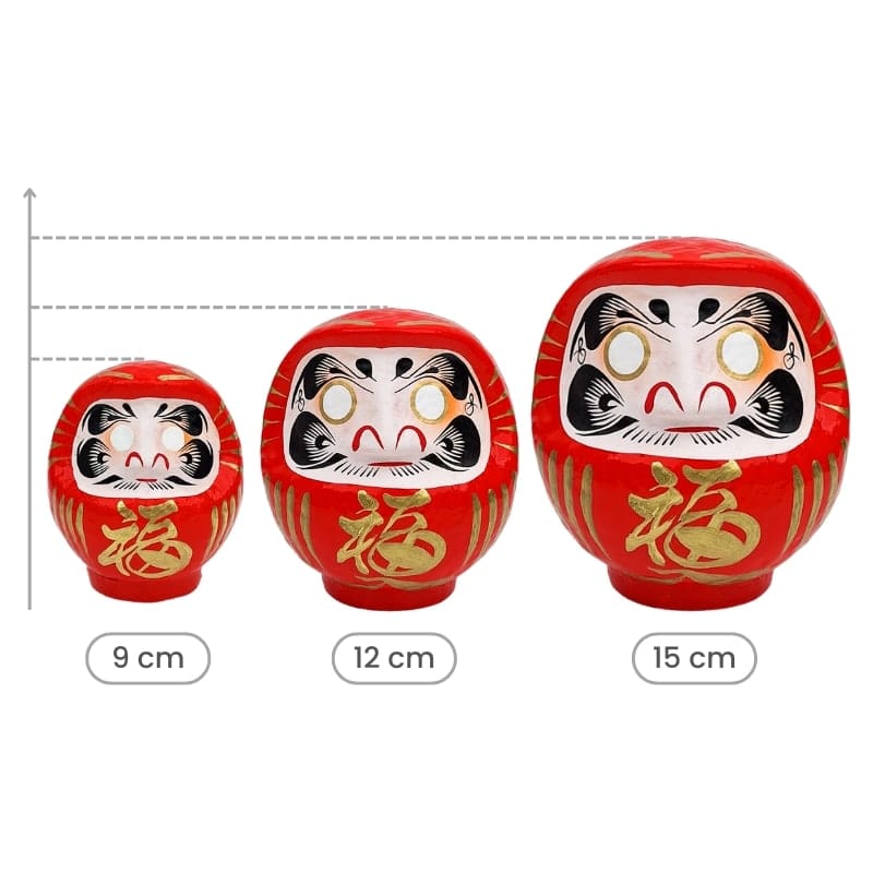 Röd japansk daruma 9 till 15 cm